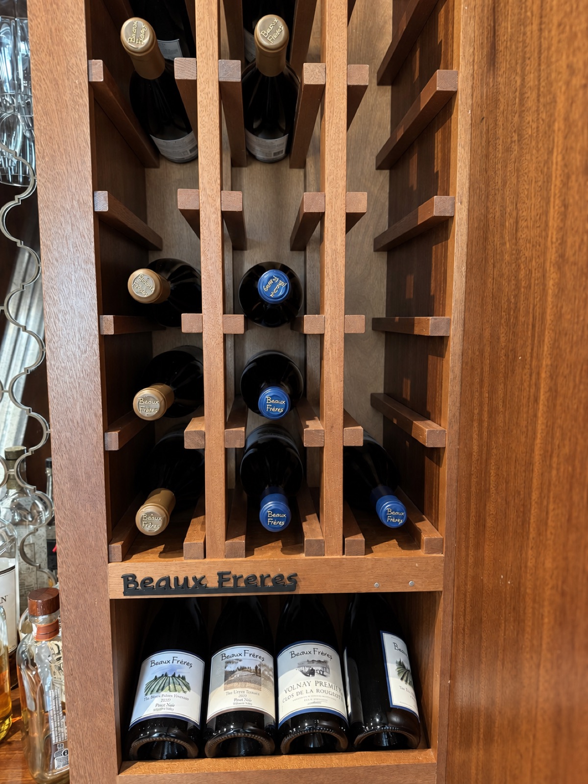 Wooden wine rack with individual bottle compartments